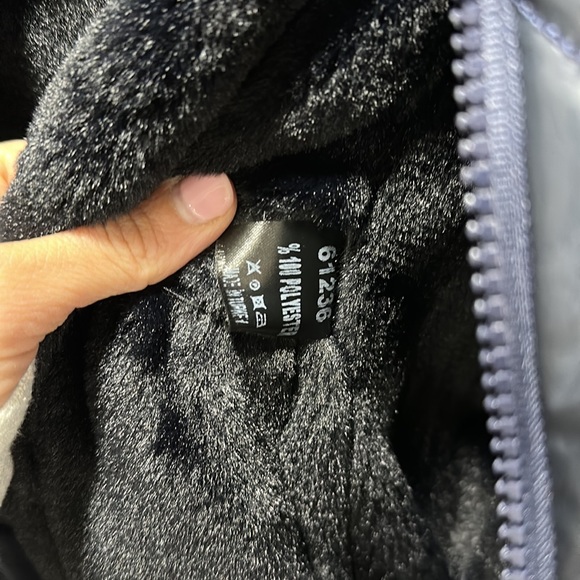 Navy blue quilted vest with fleece lining. - Picture 2 of 10